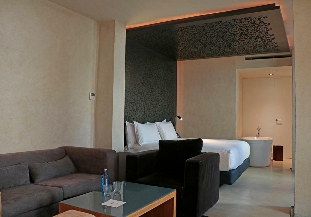 Eme Catedral Mercer Hotel Seville Ngoại thất bức ảnh A suite at the hotel
