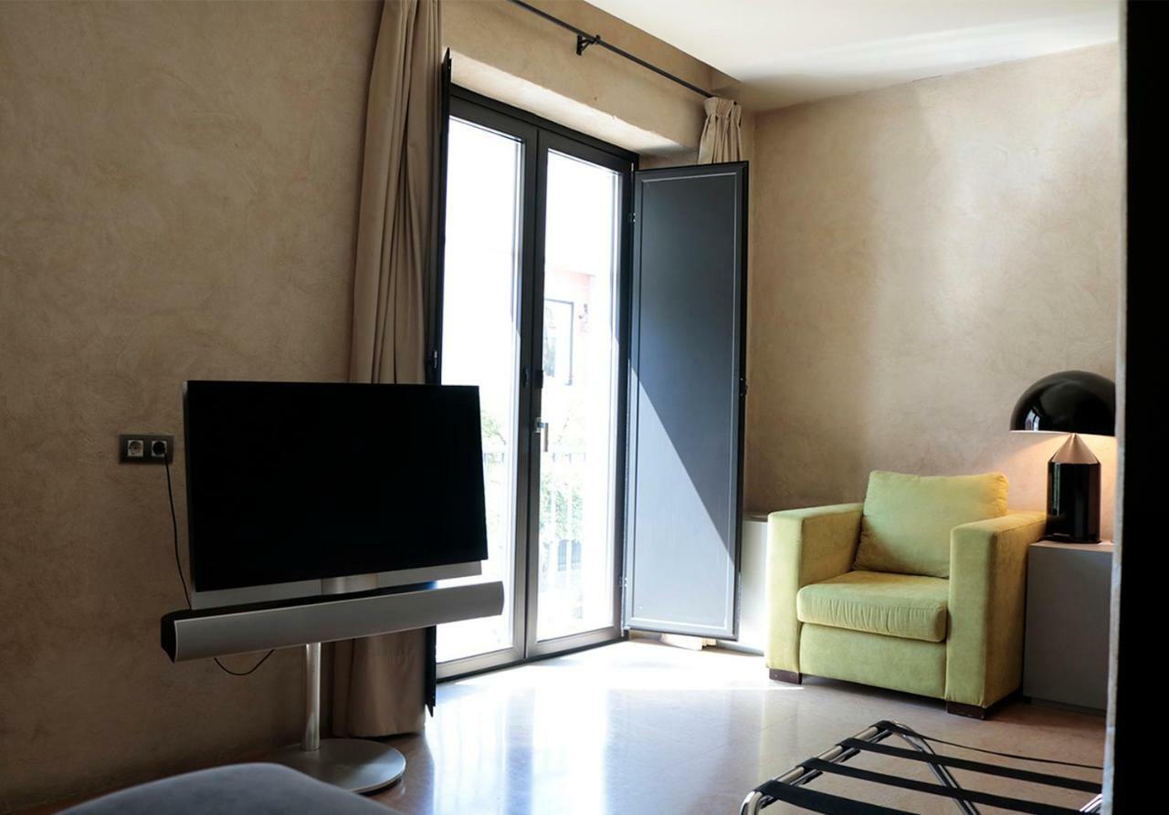 Eme Catedral Mercer Hotel Seville Ngoại thất bức ảnh A room at the hotel